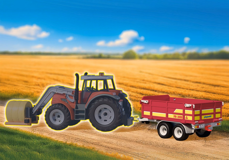 Tractor con remolque cargado de fardos de heno