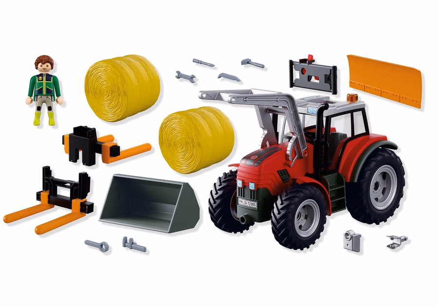 Tractor grande con fardos de heno